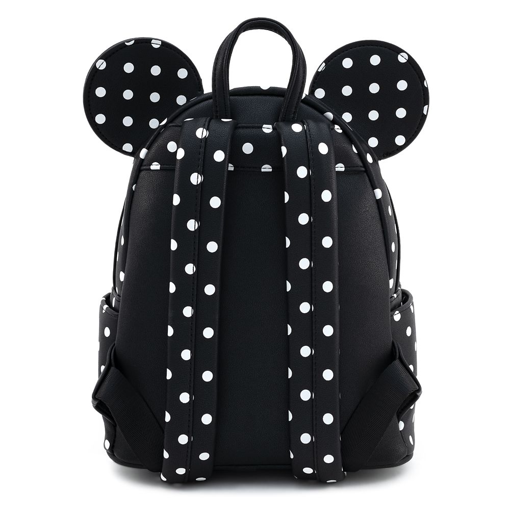 black polka dot backpack