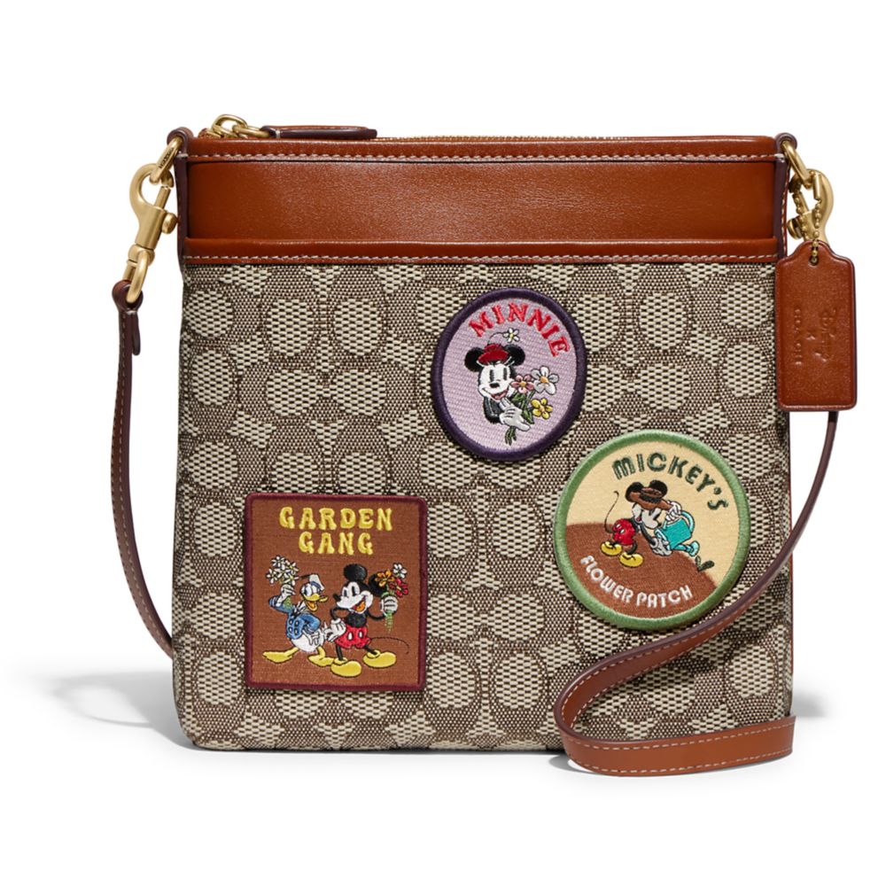 Coach sling bag store mickey mouse