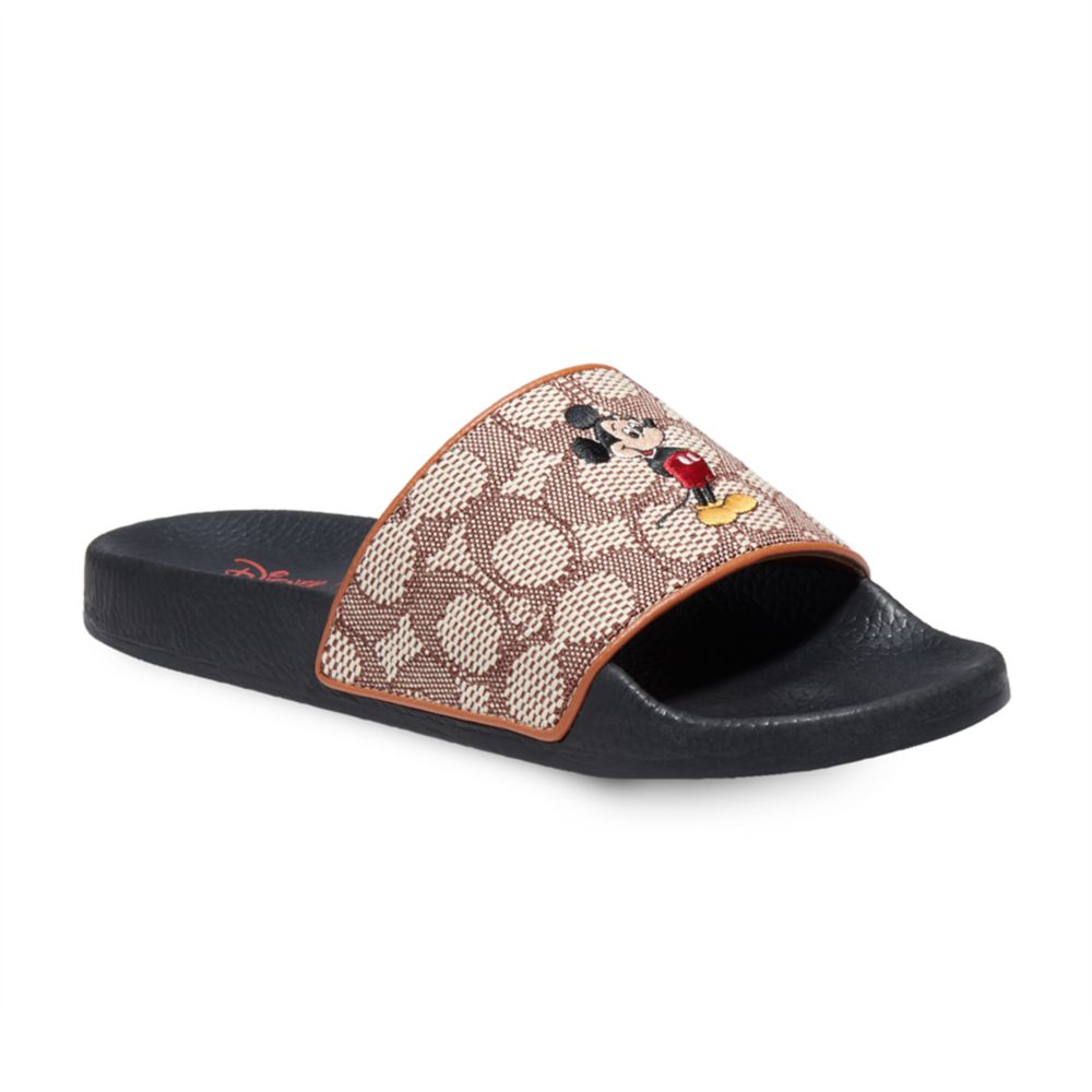 Mickey Mouse Slides for Adults by COACH – Walt Disney World has hit the shelves for purchase