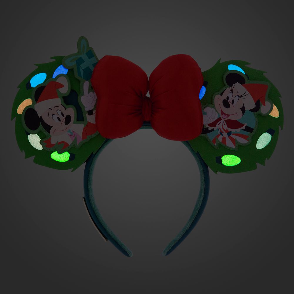 Mickey and Minnie Mouse Loungefly Glow-in-the-Dark Holiday Ear Headband for Adults has hit the shelves