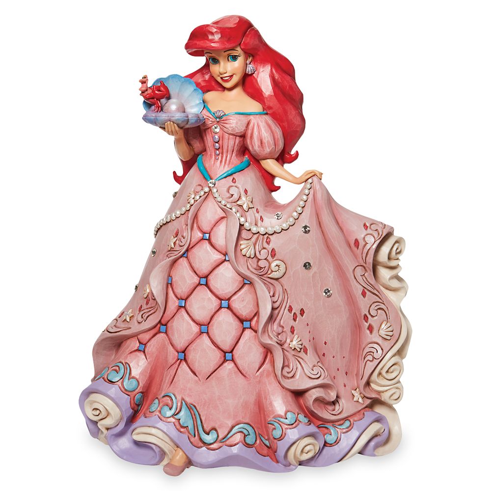 The Little Mermaid Ariel holding conch shell art transparent