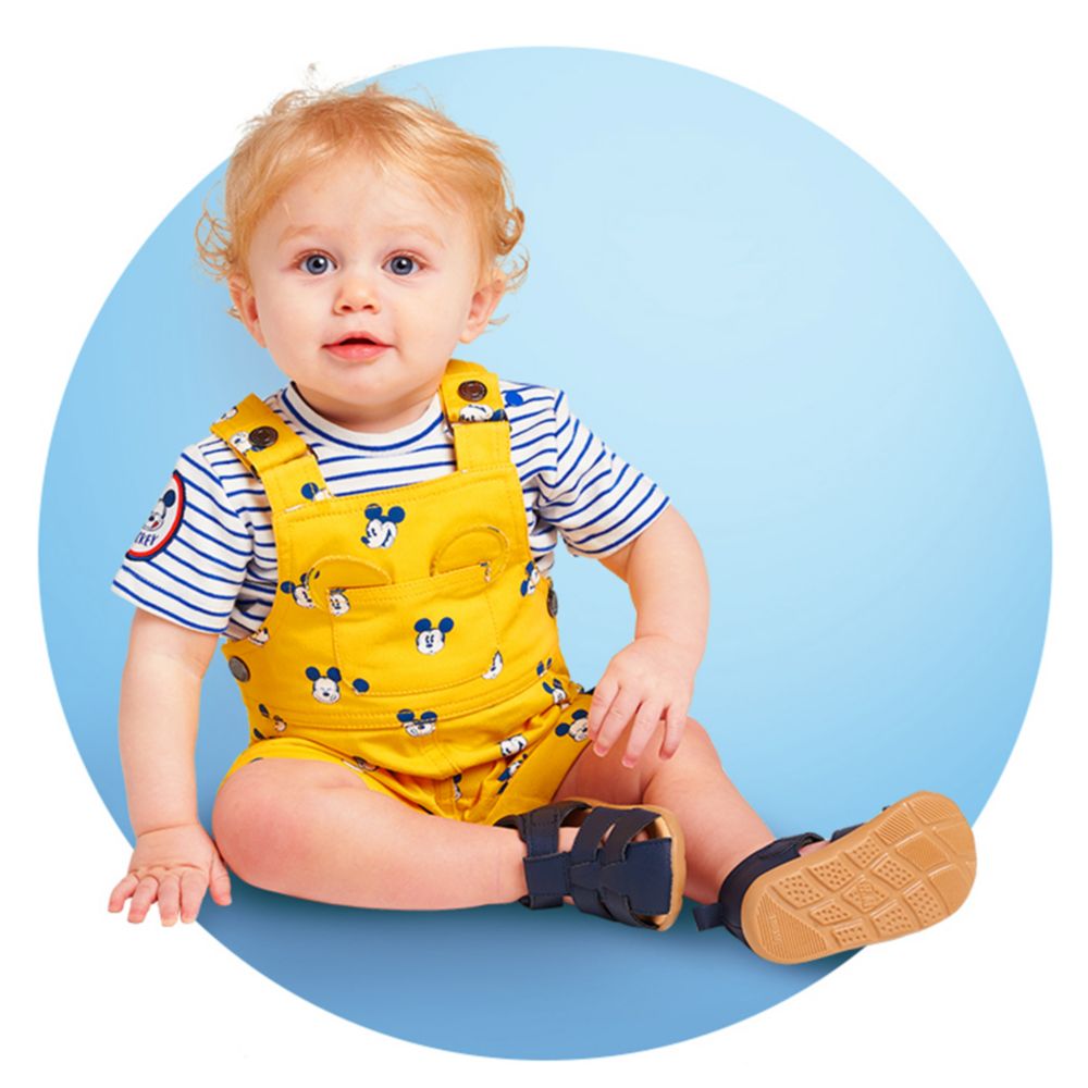 Baby in Mickey outfit