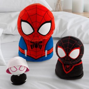 Spidey and His Amazing Friends plush toys on a bed with white sheets and pillows. Cute and cuddly superheroes!